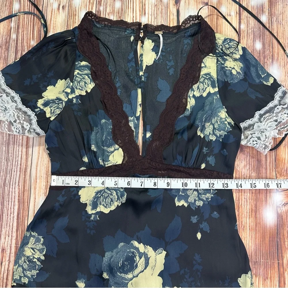 Free People Printed Mini Dress - Black Combo
Size Small - Picture 9 of 15